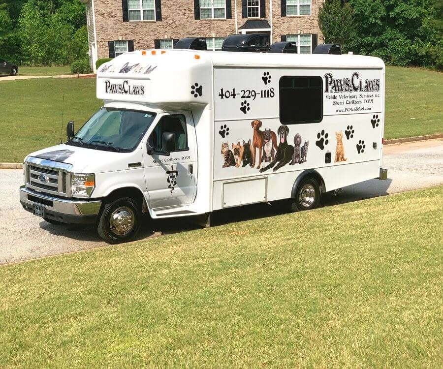 paws and claws mobile vet services - truck